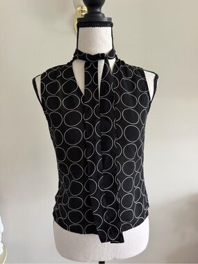 Black Sleeveless Top with White Circle Print and Tie Neck